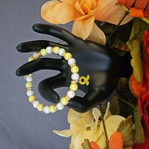 NWOT Yellow Ribbon Charm Memory Wired   -  1005